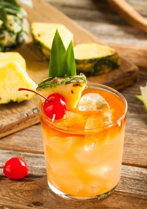 Classic Mai Tai Mocktail garnished with fresh pineapple and maraschino cherries