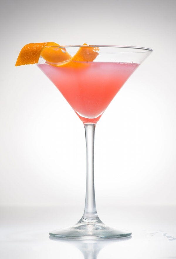 Ms Sans Classic Virgin Cosmopolitan garnished with lemon twist and made with Ms Sans Cosmopolitan