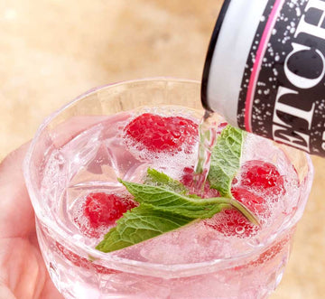 ETCH sparkling drink being poured into a glass Sans Drinks