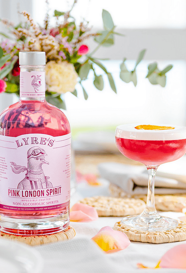 Pink Lady Gin Mocktail made with Lyre's Pink London Spirit and garnished with lemon wheel