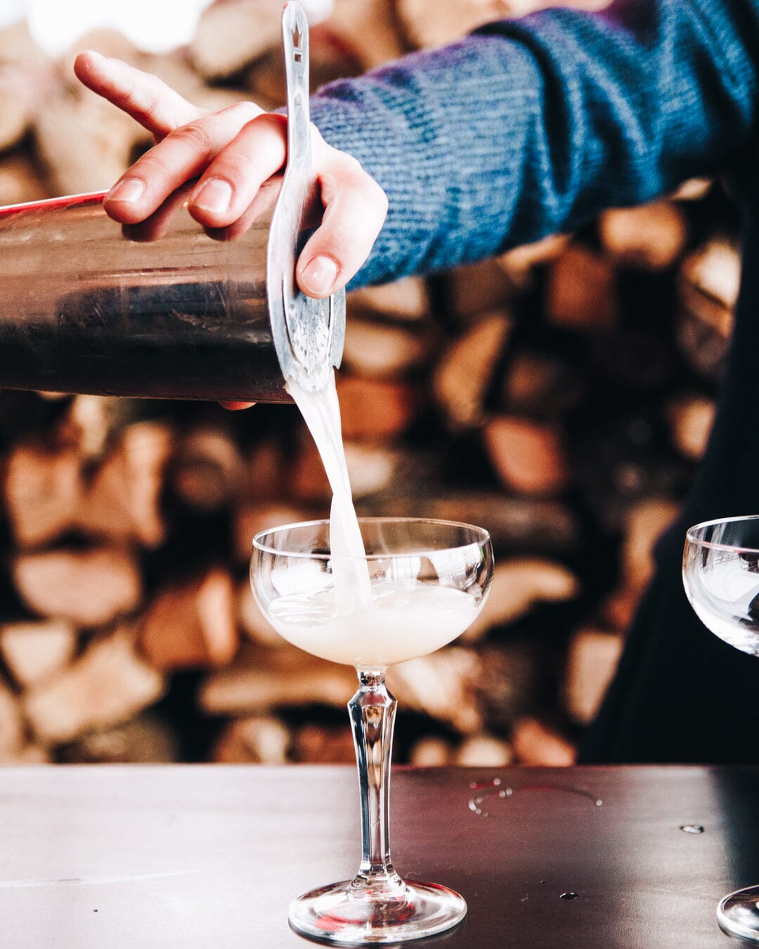 Lychee Martini Mocktail made with Ms Sans Non-Alcoholic Vodka and lynchees garnish Sans Drinks