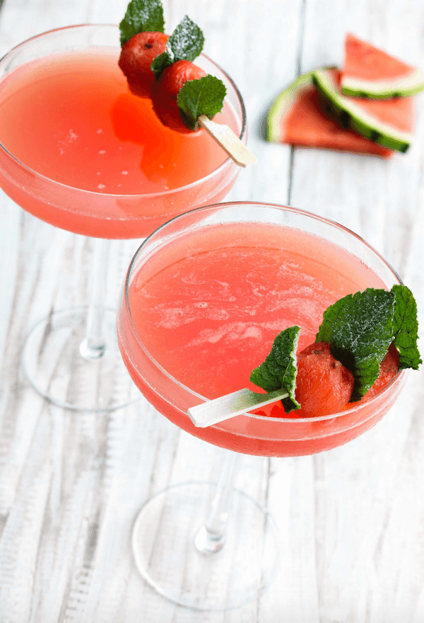 Two glasses of non-alcoholic watermelon smash made with Eisberg Alcohol-Free Sauvignon Blanc