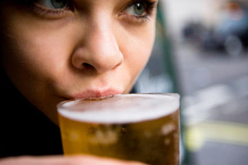 Female drinking  an alcohol-free beer