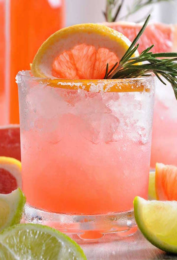Paloma Mocktail made with Ms Sans Bring a Sombrero Non-alcoholic tequila and garnished with grapefruit wedges Sans Drinks